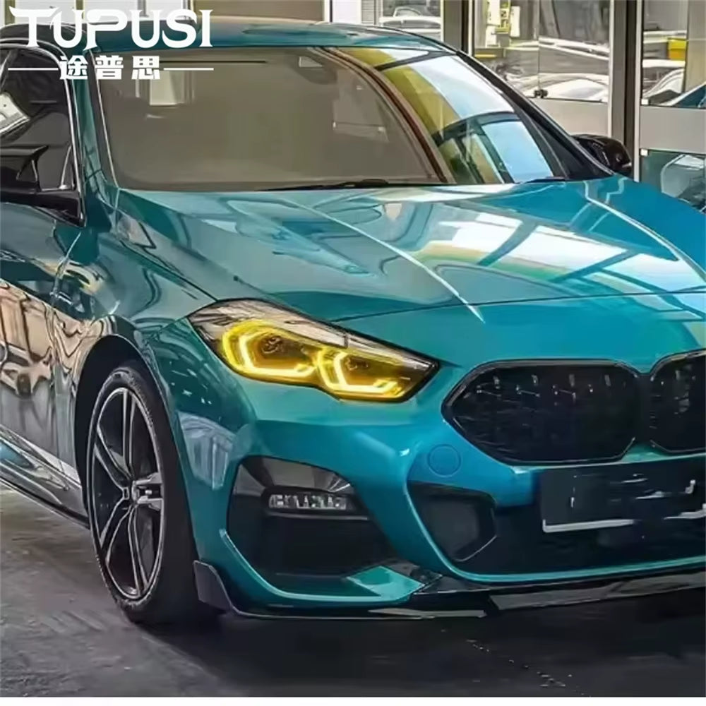 Yellow DRLs on a teal BMW F44 2 Series Gran Coupé